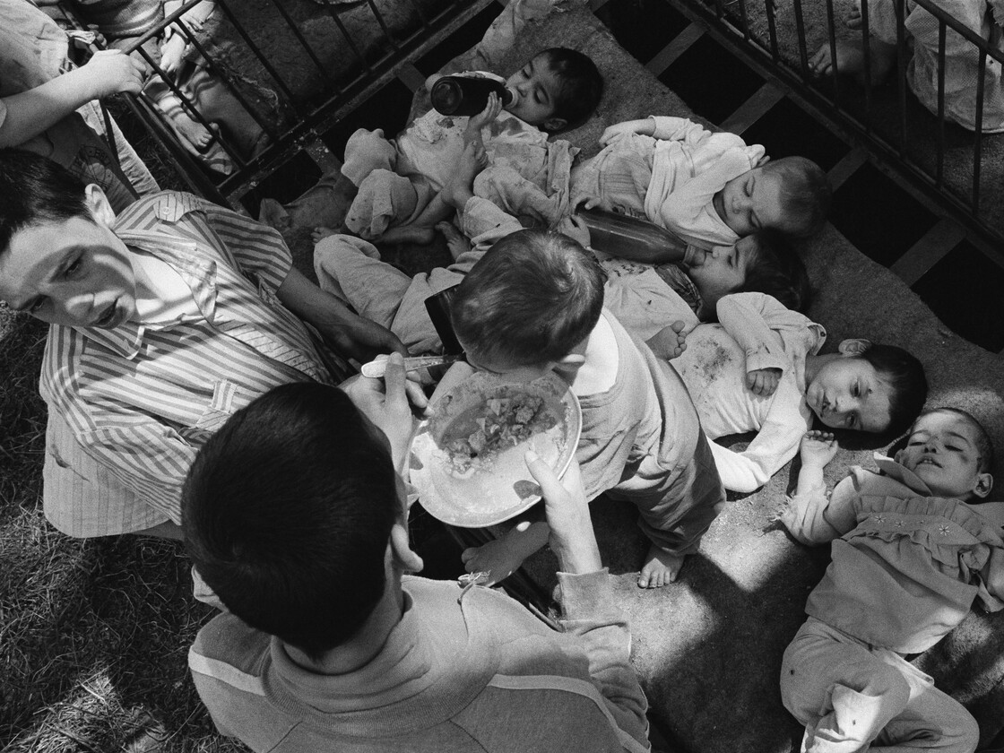 Under Romanian dictator Nicolae Ceaucescu, handicapped and orphaned children were neglected, unbathed and malnourished in orphanages throughout the country. This photo shows orphans at a state institution in Grandinari, Romania in 1989, the year Ceaucescu was overthrown and killed.