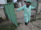 Gumar Ganiyev opens the gates of the compound where members of the Islamic sect he belongs to have lived in seclusion since the early 2000s outside Kazan, capital of the Russian province of Tatarstan, earlier this month. Gumar Ganiyev opens the gates of the compound where members of the Islamic sect he belongs to have lived in seclusion since the early 2000s outside Kazan, capital of the Russian province of Tatarstan, earlier this month.