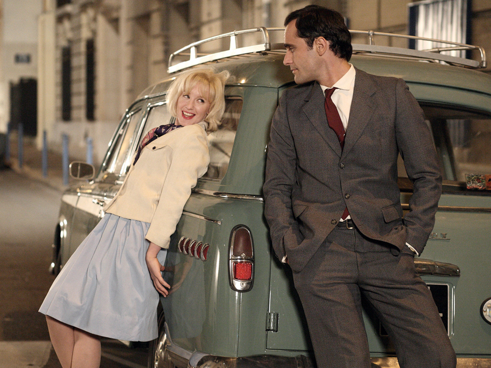 In the '60s, accidental prostitute Madeleine (Ludivine Sagnier) first encounters Czech doctor Jaromil (Rasha Bukvic). As the decades pass, they will age into Catherine Deneuve and Milos Forman.
