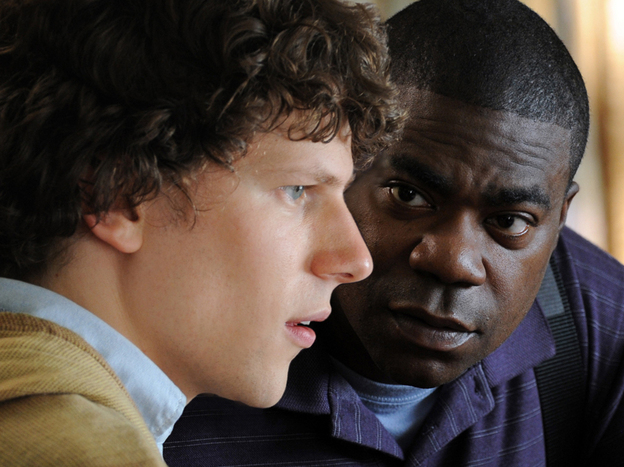 Sprinkles (Tracy Morgan) encourages Eli (Jesse Eisenberg) to shrug off the burden of his troubled family and pursue his talents as a pianist.