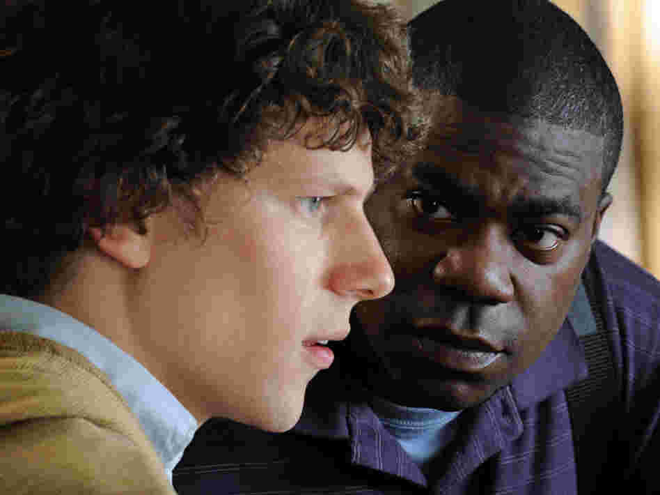 Sprinkles (Tracy Morgan) encourages Eli (Jesse Eisenberg) to shrug off the burden of his troubled family and pursue his talents as a pianist.