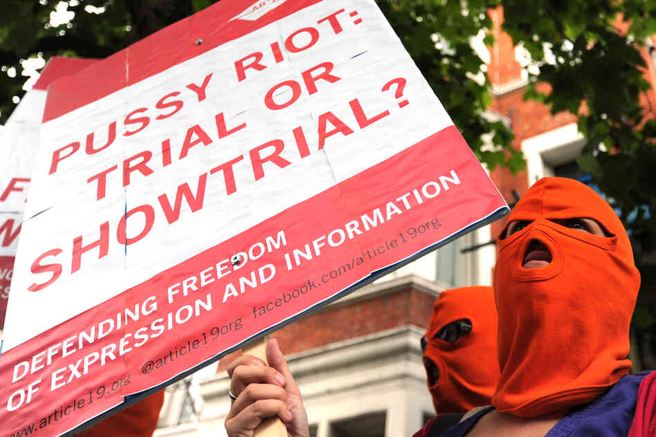 Protesters congregate near the Russian Embassy in London.