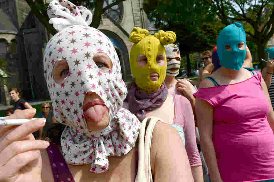 Masked supporters of Pussy Riot gather in Hamburg, Germany.