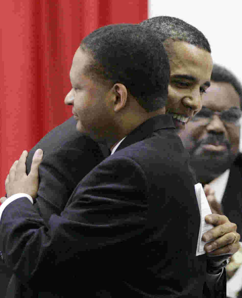 Barack Obama, then a Democratic candidate for president, hugs former U.S. Rep. Artur Davis, in Selma, Ala., in 2007.