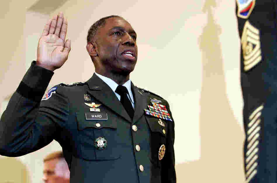 Army Lt. Gen. William E. Kip Ward is adminstered the oath of four-star General, the Army's highest rank of general.