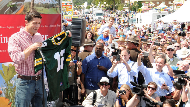 Republican vice presidential candidate Paul Ryan holds up a Green Bay Packers jersey during a campaign stop at the Iowa State Fair.