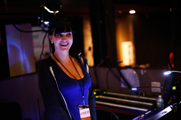 Lighting director Jackie Finney runs the light show during concerts for the band fun.