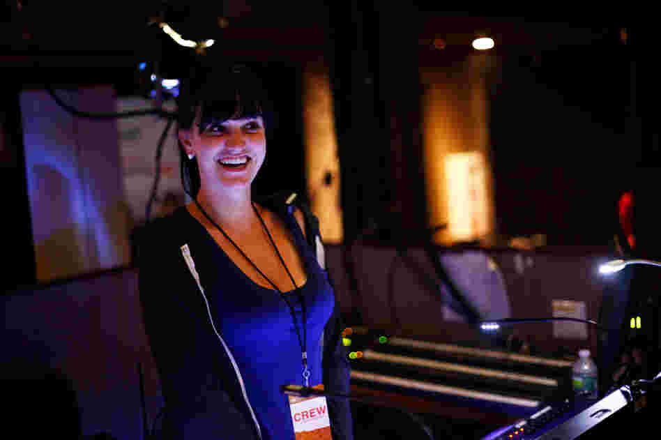 Lighting director Jackie Finney runs the light show during concerts for the band fun.