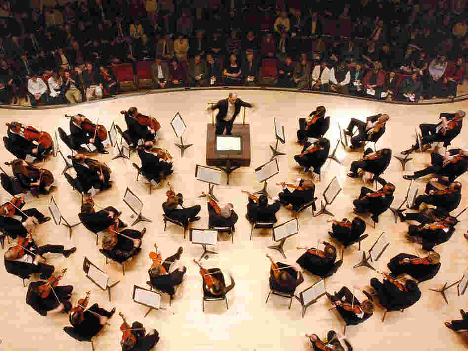 The Atlanta Symphony Orchestra is facing budget battles, and the shame of being silenced while backing a pop group.