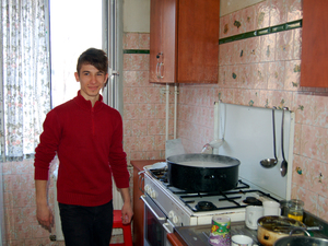 Many Romanian kids who grow up in orphanages lack life skills when they leave the institutions at age 18. At Grosuleac's home, boys go to school, get jobs and do household chores. Here, Emanuel prepares a rice dish for dinner. Many Romanian kids who grow up in orphanages lack life skills when they leave the institutions at age 18. At Grosuleac's home, boys go to school, get jobs and do household chores. Here, Emanuel prepares a rice dish for dinner.