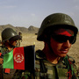 Afghan soldiers (right) patrol with U.S. troops in the Panjwai district of southern Afghanistan in May. The two armies have been working together for years, but Afghan attacks against U.S. and NATO forces have been rising recently. Afghan soldiers (right) patrol with U.S. troops in the Panjwai district of southern Afghanistan in May. The two armies have been working together for years, but Afghan attacks against U.S. and NATO forces have been rising recently.