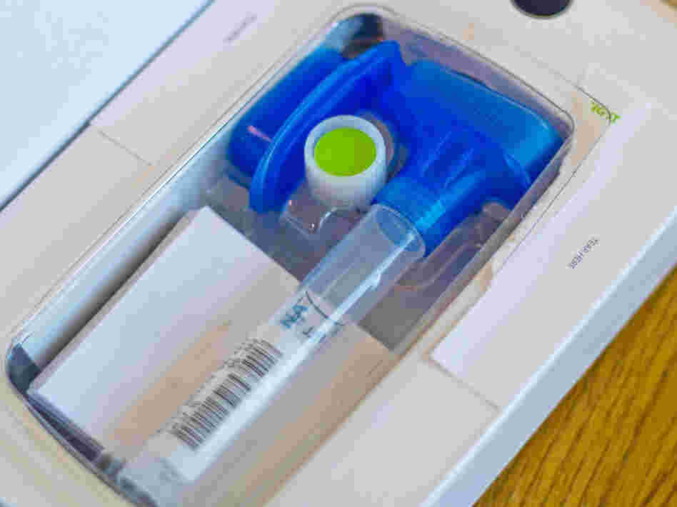 Submitting a DNA sample to social networking company 23andMe entails spitting a saliva sample into a tube like this and sending it in.