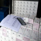 Thousands of doses of cholera vaccine sit in a refrigerated trailer in a United Nations compound in Saint-Marc, Haiti, in March. After some delays, a vaccination project proved successful.