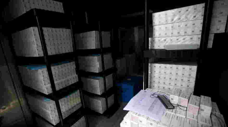 Thousands of doses of cholera vaccine sit in a refrigerated trailer in a United Nations compound in Saint-Marc, Haiti, in March. After some delays, a vaccination project proved successful. Thousands of doses of cholera vaccine sit in a refrigerated trailer in a United Nations compound in Saint-Marc, Haiti, in March. After some delays, a vaccination project proved successful.