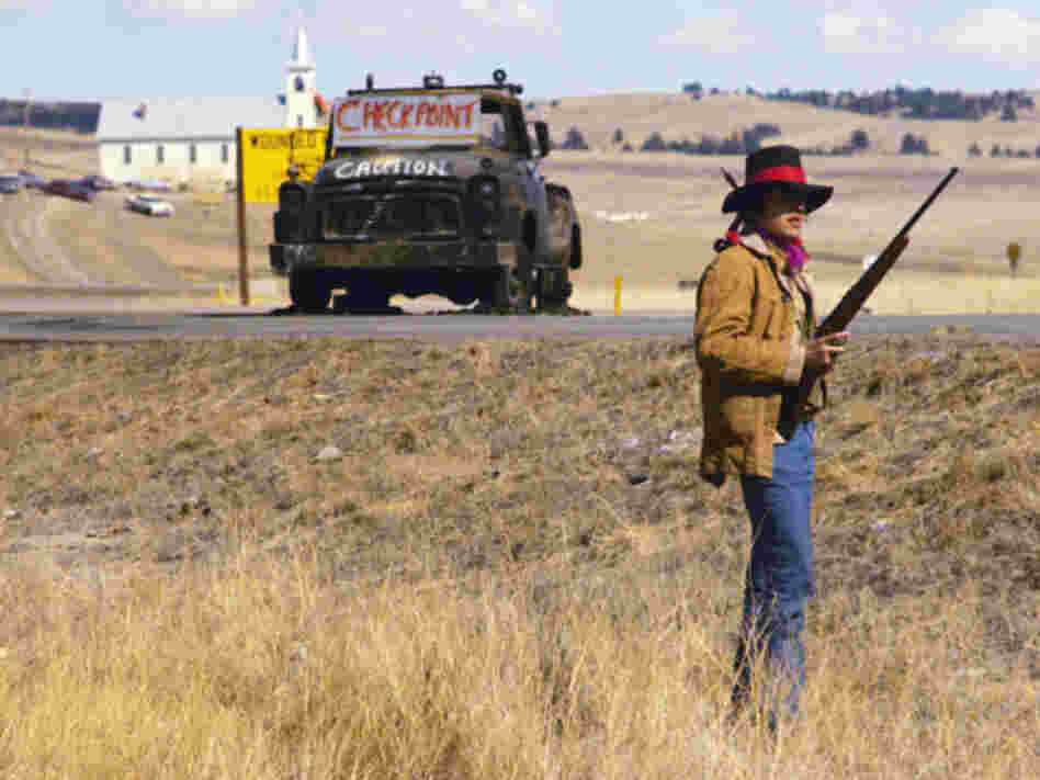 In 1973, members of the American Indian Movement occupied the town of Wounded Knee, S.D., on the Pine Ridge Indian Reservation. They were protesting the murder of an Oglala Lakota man and the failed impeachment of a tribal president that AIM members accused of corruption. The protests escalated into a deadly standoff that lasted 71 days. In 1973, members of the American Indian Movement occupied the town of Wounded Knee, S.D., on the Pine Ridge Indian Reservation. They were protesting the murder of an Oglala Lakota man and the failed impeachment of a tribal president that AIM members accused of corruption. The protests escalated into a deadly standoff that lasted 71 days.