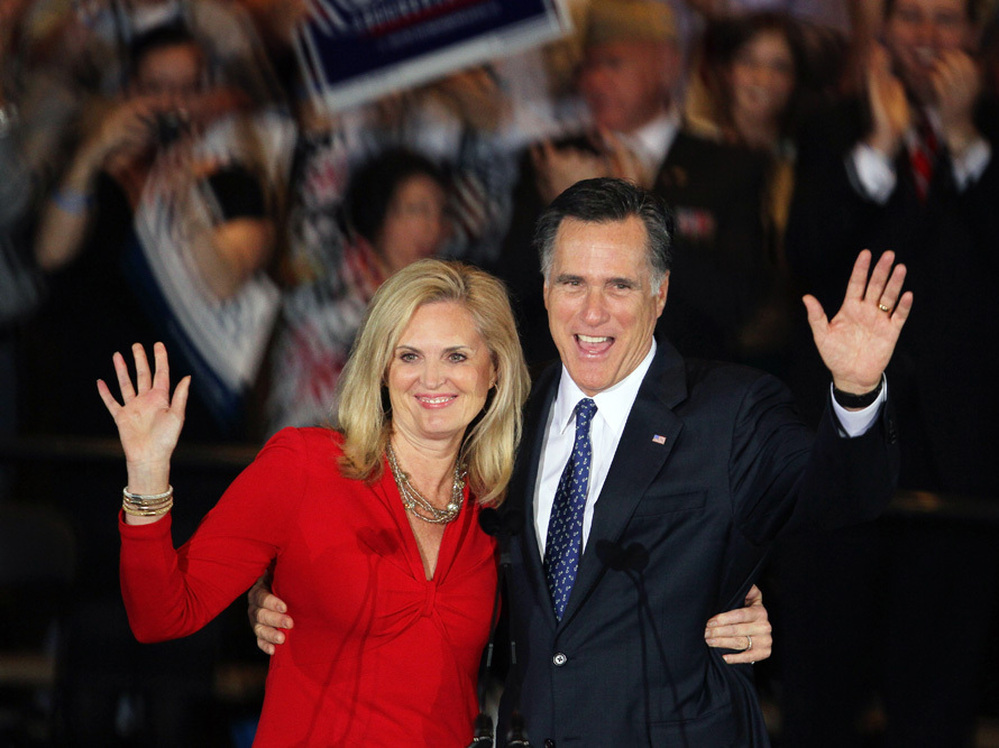 Republican presidential candidate Mitt Romney and his wife, Ann, greet supporters during an Illinois primary victory party in March.