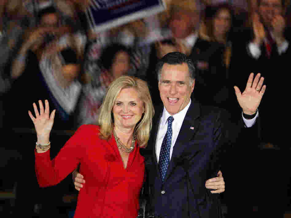 Republican presidential candidate Mitt Romney and his wife, Ann, greet supporters during an Illinois primary victory party in March.