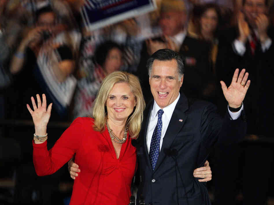 Republican presidential candidate Mitt Romney and his wife, Ann, greet supporters during an Illinois primary victory party in March.