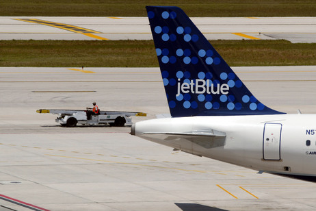 A JetBlue Airways aircraft. A JetBlue Airways aircraft.