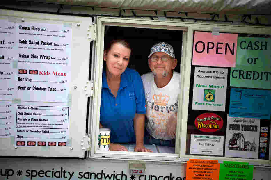 Patricia and Steven Cumber run the Food Tailor food truck in downtown Oshkosh, Wis. It's their primary source of income after Steven lost his job as a welder. Patricia and Steven Cumber run the Food Tailor food truck in downtown Oshkosh, Wis. It's their primary source of income after Steven lost his job as a welder.