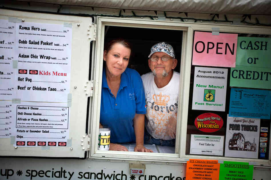 Patricia and Steven Cumber run the Food Tailor food truck in downtown Oshkosh, Wis. It's their primary source of income after Steven lost his job as a welder. Patricia and Steven Cumber run the Food Tailor food truck in downtown Oshkosh, Wis. It's their primary source of income after Steven lost his job as a welder.