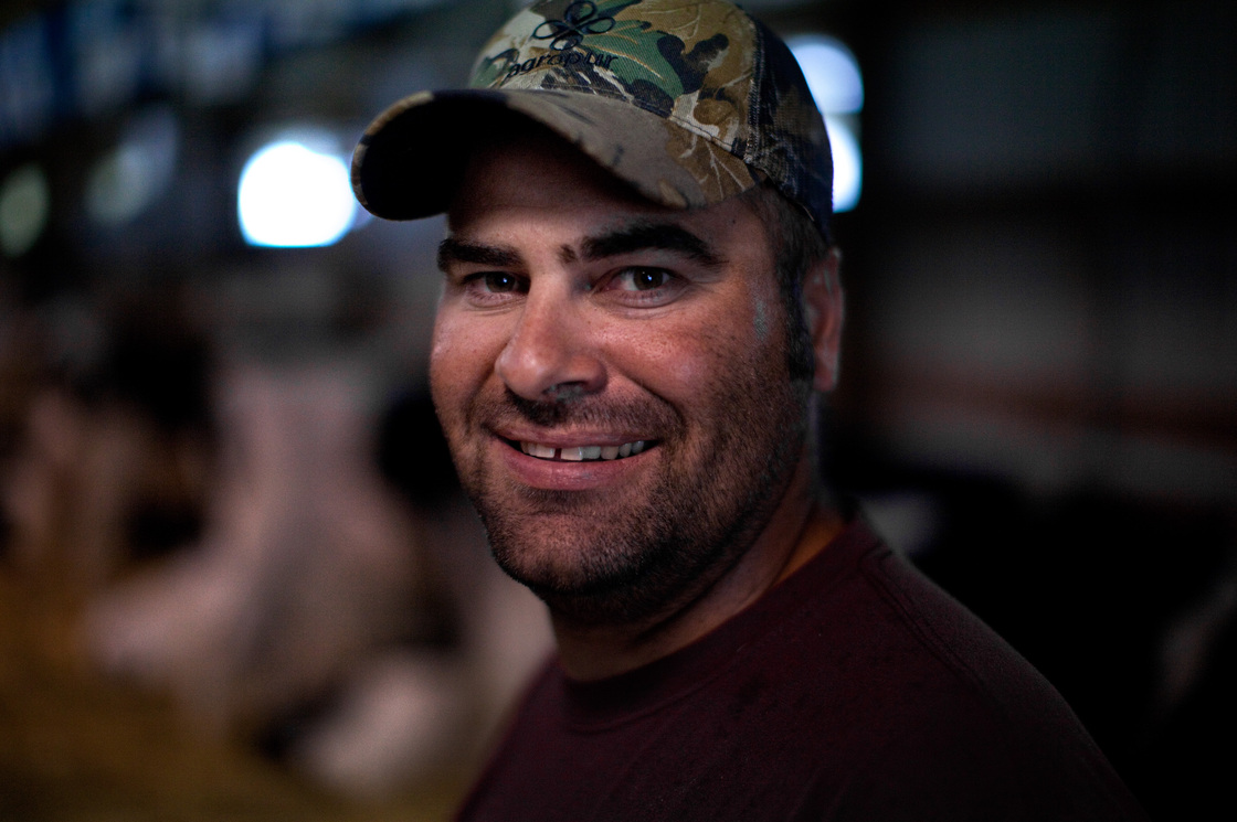 Charlie Knigge is a dairy farmer from Omro, Wis. He talked to NPR at the Winnebago County Fair in Oshkosh. "I'm not a big fan of how big the government's gotten or how many people are living off the government now," he says.