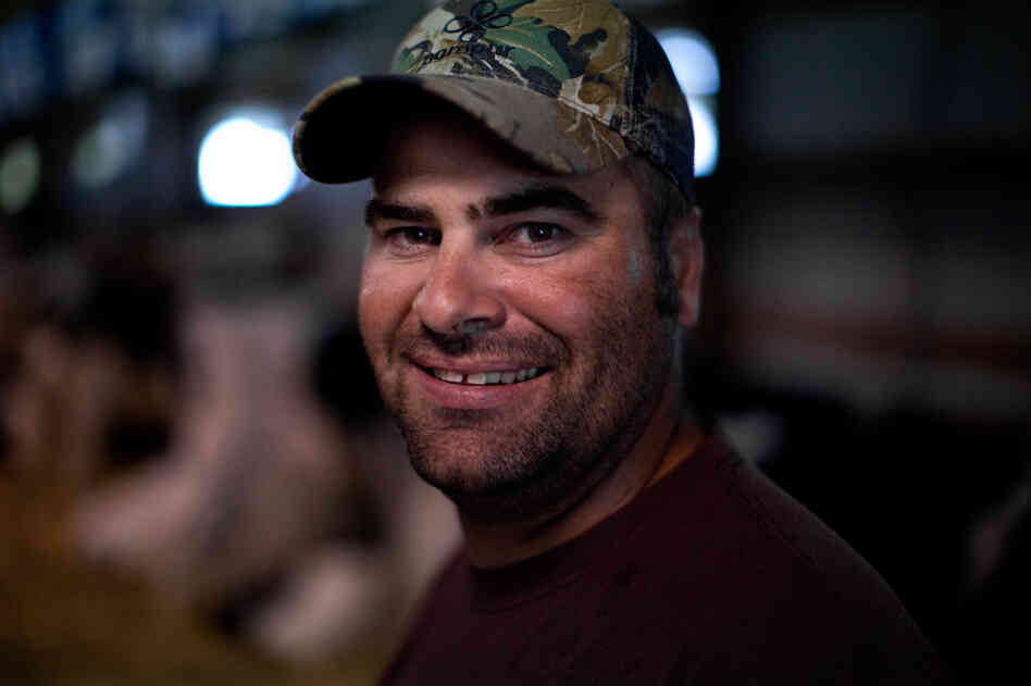 Charlie Knigge is a dairy farmer from Omro, Wis. He talked to NPR at the Winnebago County Fair in Oshkosh. "I'm not a big fan of how big the government's gotten or how many people are living off the government now," he says.