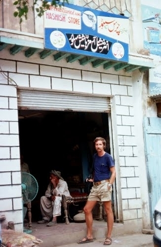 A German tourist stands outside a hashish shop in 1976. Shops selling hashish sprang up in northwestern Pakistan when young Western tourists began to pour in from Afghanistan in the late 1960s.