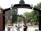 Persons walk across the campus of Saint Louis University in St. Louis in 2006.