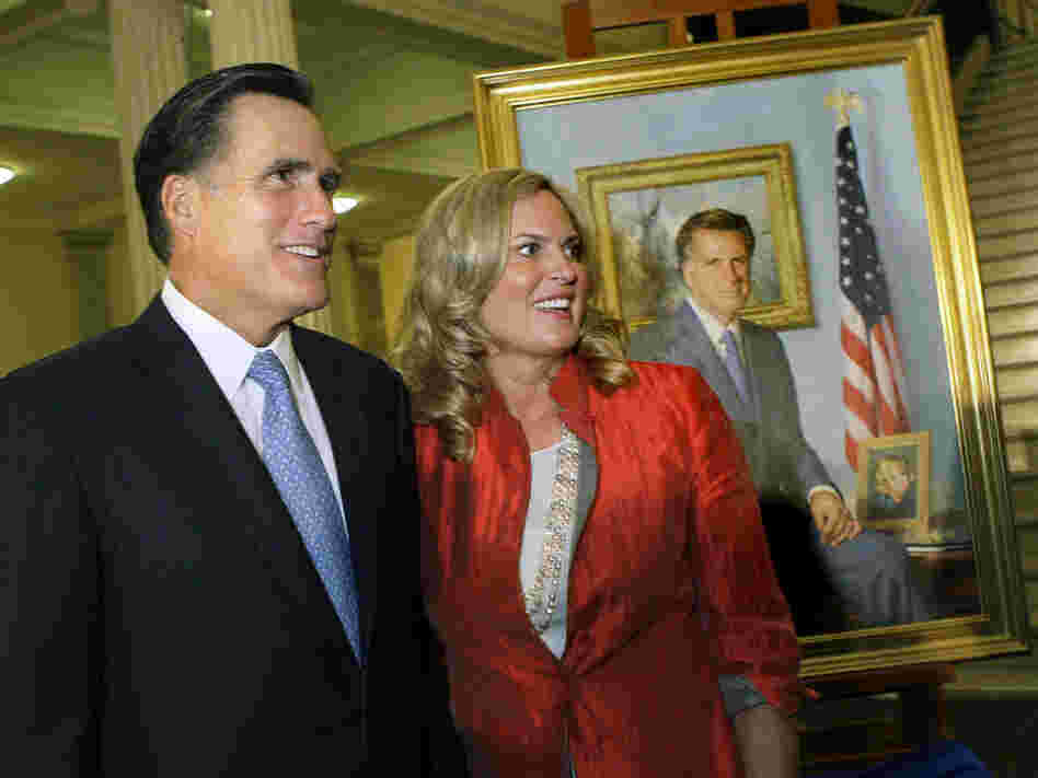 Former Massachusetts Gov. Mitt Romney and his wife, Ann, greet guests after his official portrait is unveiled in 2009 during a ceremony on the Grand Staircase at the Statehouse in Boston.