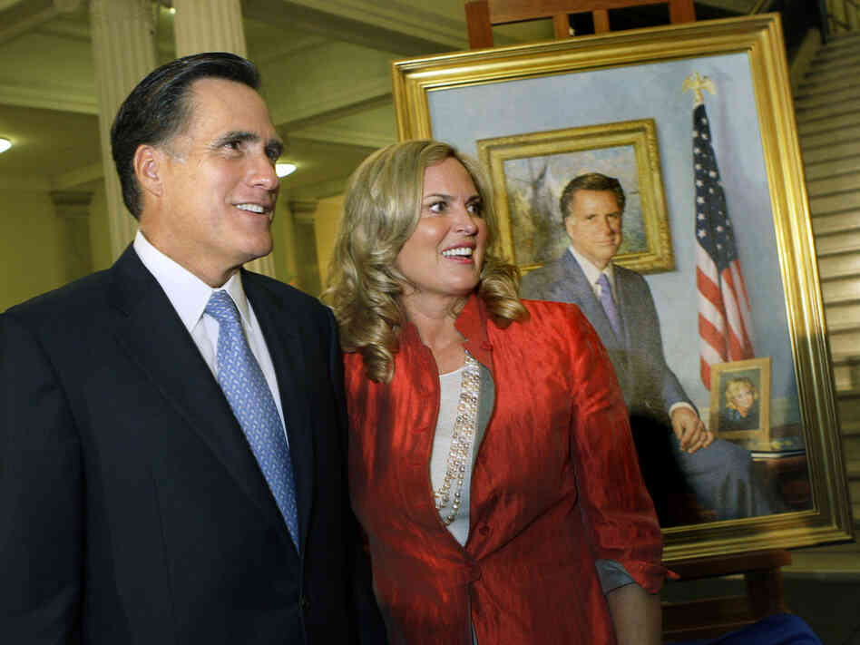 Former Massachusetts Gov. Mitt Romney and his wife, Ann, greet guests after his official portrait is unveiled in 2009 during a ceremony on the Grand Staircase at the Statehouse in Boston.