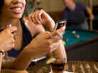 A growing number of smartphone apps use internal GPS to help singles locate potential mates nearby. While men are enthusiastic about the apps, women have been slower to adopt them.