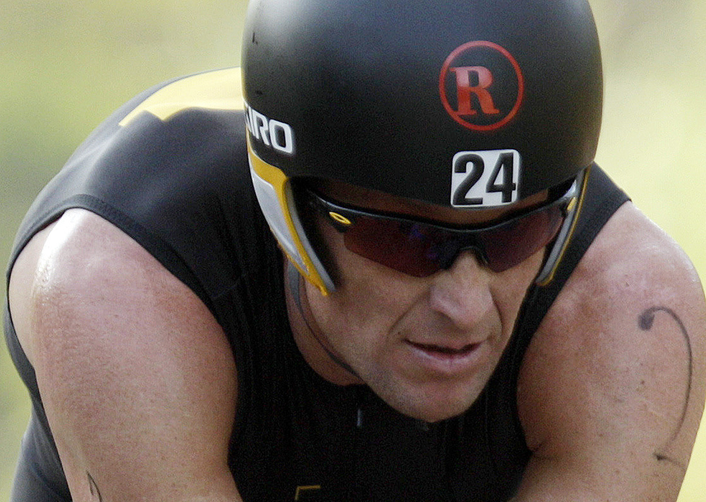 Lance Armstrong competes in the Ironman Panama 70.3. triathlon in Panama City, Panama.