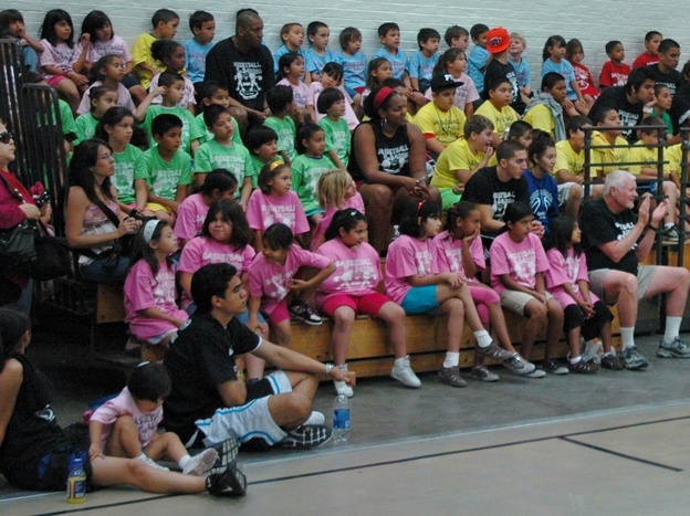 A rainbow of teams at basketball camp.