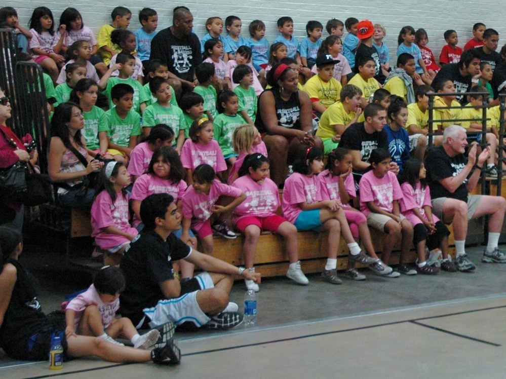 A rainbow of teams at basketball camp.