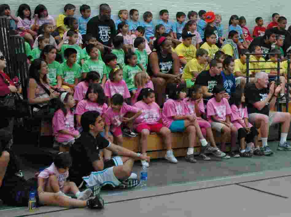 A rainbow of teams at basketball camp.