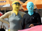 Chinese beachgoers wear face-kinis in Qingdao, northeast China's Shandong province. The face masks allow people to enjoy the water and sand — but not the effects of the sun. Chinese beachgoers wear face-kinis in Qingdao, northeast China's Shandong province. The face masks allow people to enjoy the water and sand — but not the effects of the sun.