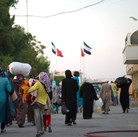 Syrians fleeing increased violence arriving last week at the border between the Syrian town of Azaz and the neighboring Turkish town of Kilis.