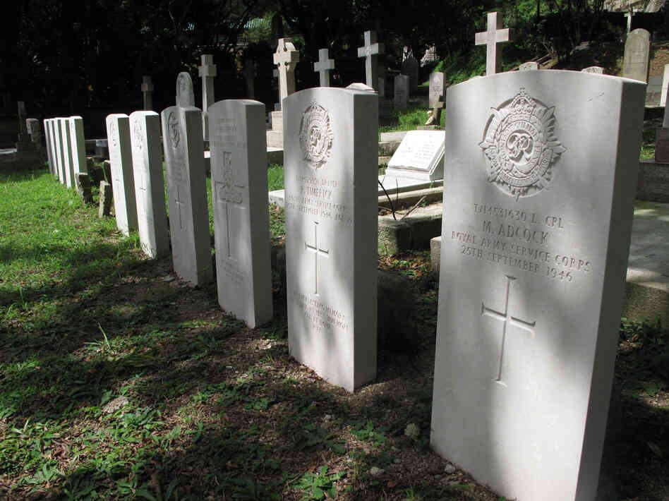 A series of identical graves mark the resting spots for 11 British soldiers, including Col. Cyril Wild. His plane crashed in 1946 en route to Tokyo,where he was heading to give evidence against Japanese army officers at the Tokyo War Crimes Tribunal. He'd been the only fluent Japanese speaker in the British army, and he helped negotiate the Japanese surrender in Singapore. A series of identical graves mark the resting spots for 11 British soldiers, including Col. Cyril Wild. His plane crashed in 1946 en route to Tokyo,where he was heading to give evidence against Japanese army officers at the Tokyo War Crimes Tribunal. He'd been the only fluent Japanese speaker in the British army, and he helped negotiate the Japanese surrender in Singapore.