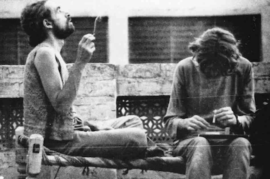 Western tourists smoke hashish on the roof of a hotel in Peshawar in 1972. Pakistan was an important destination along the "hippie trail," a popular route for Western backpackers that ran across Turkey, Iran, Afghanistan, Pakistan and India, usually ending in Nepal. 