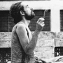 Western tourists smoke hashish on the roof of a hotel in Peshawar in 1972. Pakistan was an important destination along the "hippie trail," a popular route for young Western backpackers that ran across Turkey, Iran, Afghanistan, Pakistan and India, usually ending in Nepal.
