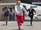 A bank robber, played by Bradley Cooper, is in hot pursuit of the runaway protagonists in Hit and Run. A bank robber, played by Bradley Cooper, is in hot pursuit of the runaway protagonists in Hit and Run.