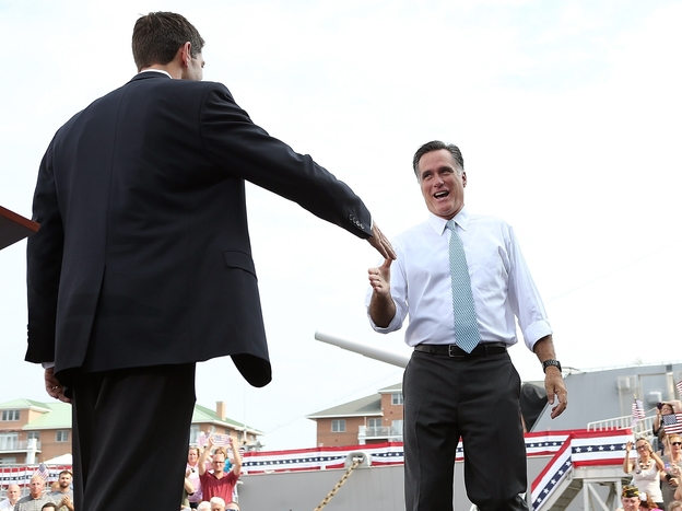 Republican Presidential Candidate Gov. Mitt Romney welcomes running mate Rep. Paul Ryan on stage in Norfolk, Va.