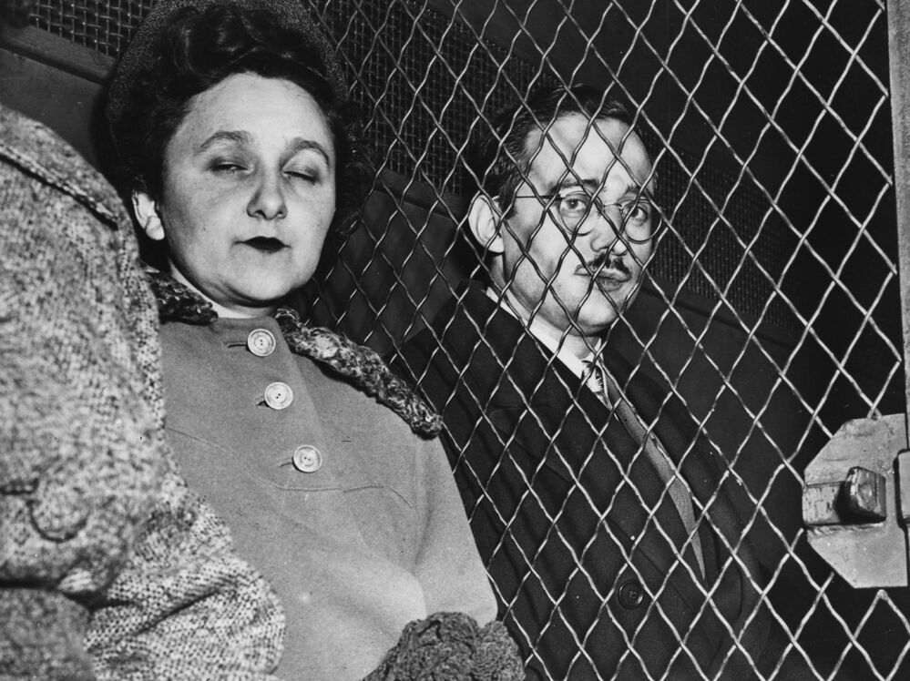Julius and Ethel Rosenberg are taken to prison after being found guilty of nuclear espionage. They were subsequently executed.