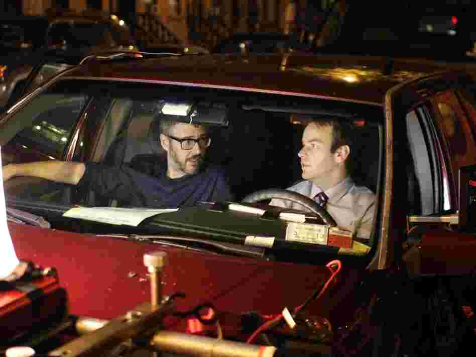Ira Glass (left) and Mike Birbiglia collaborate on the set.