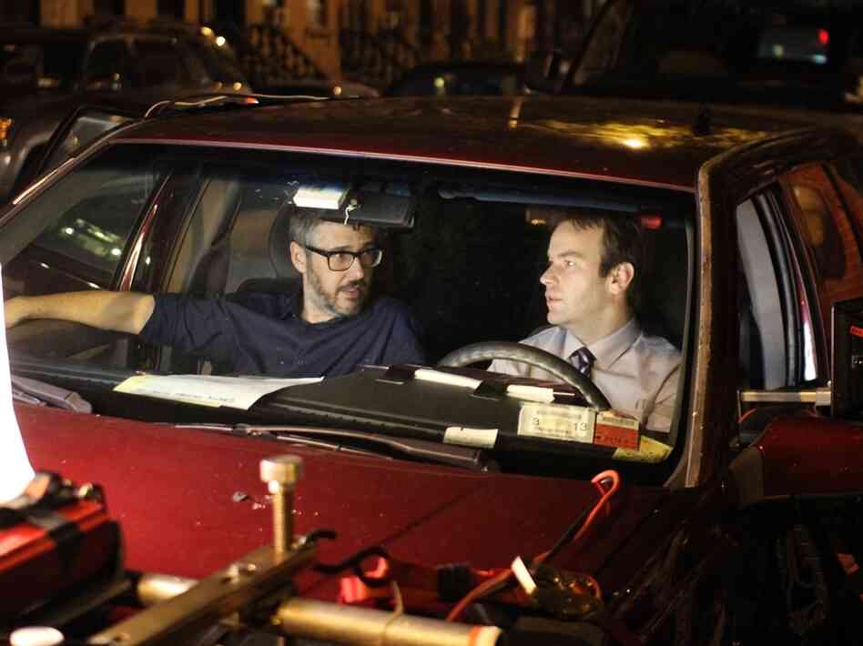 Ira Glass (left) and Mike Birbiglia collaborate on the set.