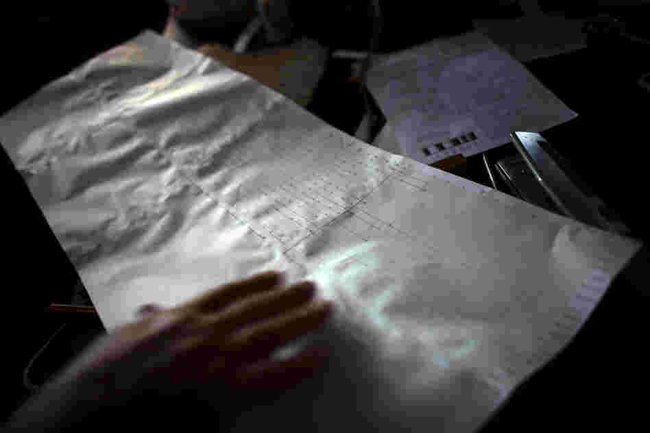A tree's rings are marked on graph paper. Experts use this technique, called skeleton plotting, to help them cross-date tree-ring samples. This sample evinces no fire scars in the latest years of the tree's life.