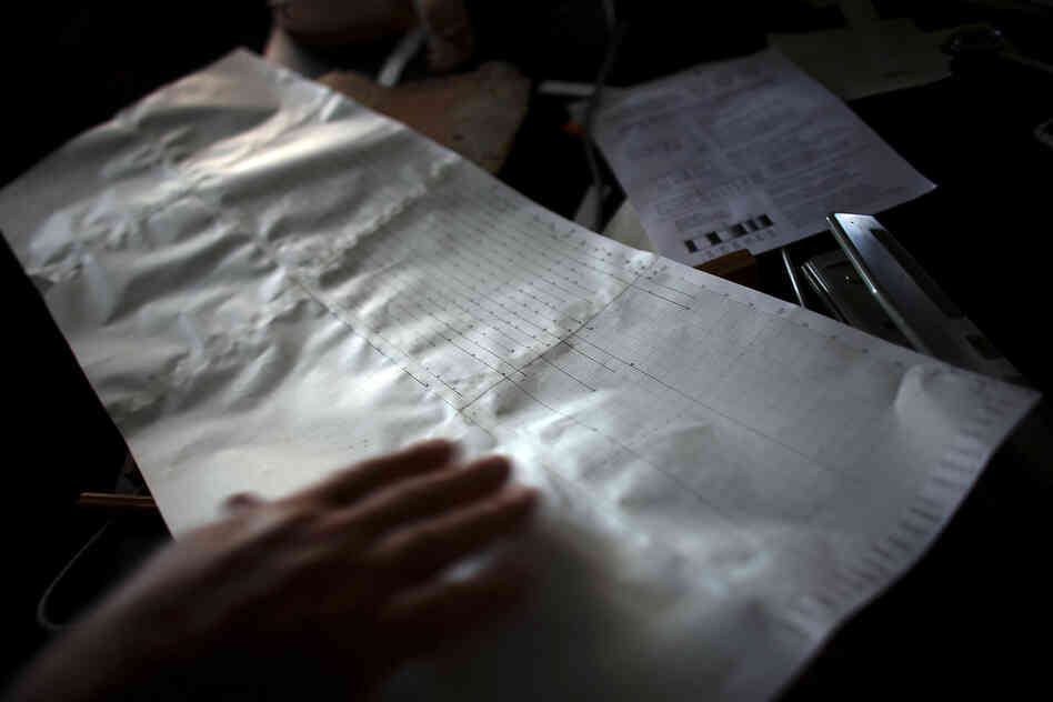 A tree's rings are marked on graph paper. Experts use this technique, called skeleton plotting, to help them cross-date tree-ring samples. This sample evinces no fire scars in the latest years of the tree's life.