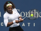 Serena Williams returns a shot during a match at the Western & Southern Open tennis tournament in Mason, Ohio. Serena Williams returns a shot during a match at the Western & Southern Open tennis tournament in Mason, Ohio.