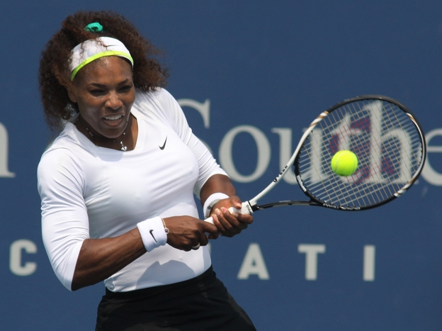 Serena Williams returns a shot during a match at the Western & Southern Open tennis tournament in Mason, Ohio.